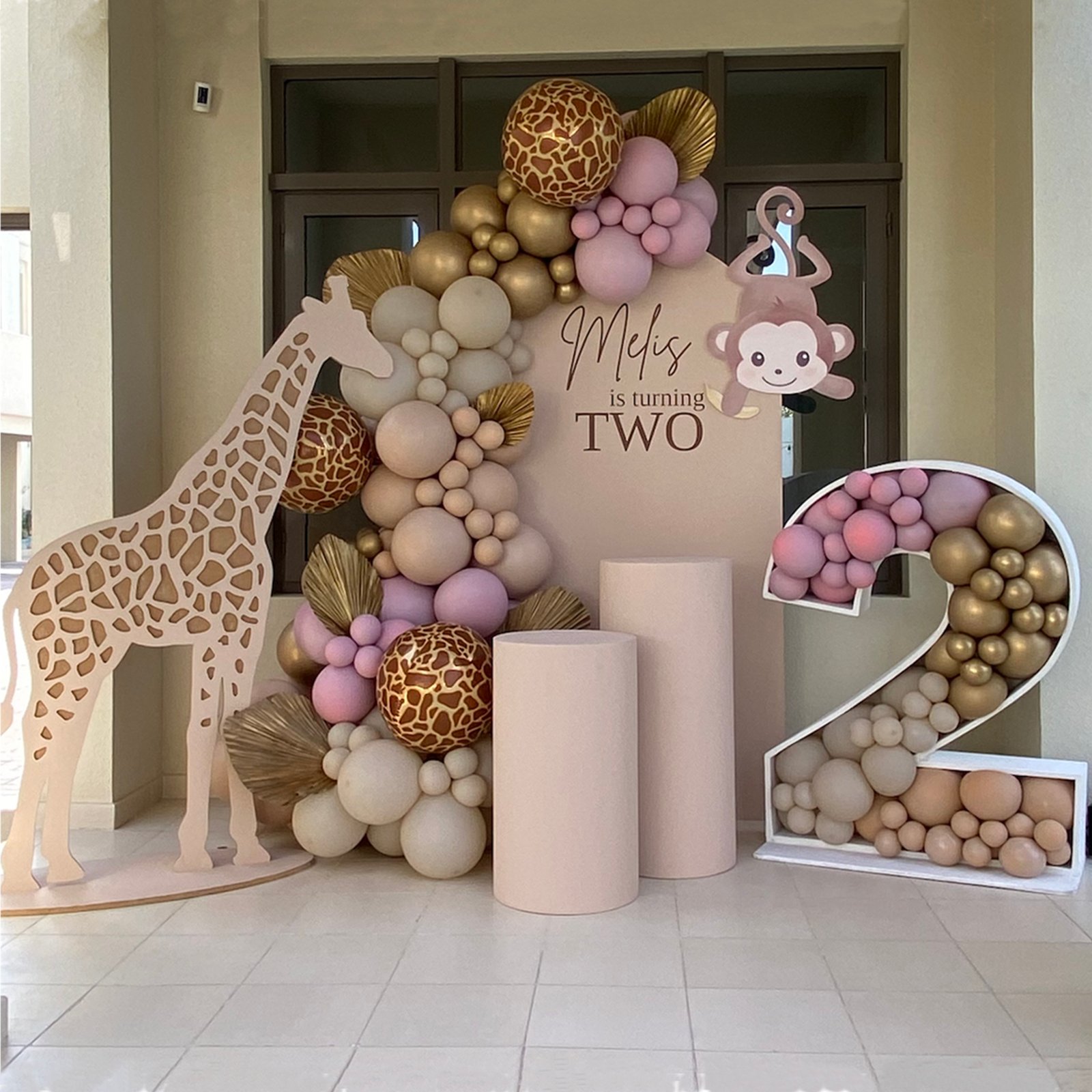 Giraffe Theme (1x H - 2m x 1m semi arch Personalization on backdrop Balloon garland 1x giraffe stand 2 x circle plinths 1x number 2 with balloons 1 x foamboard elements)