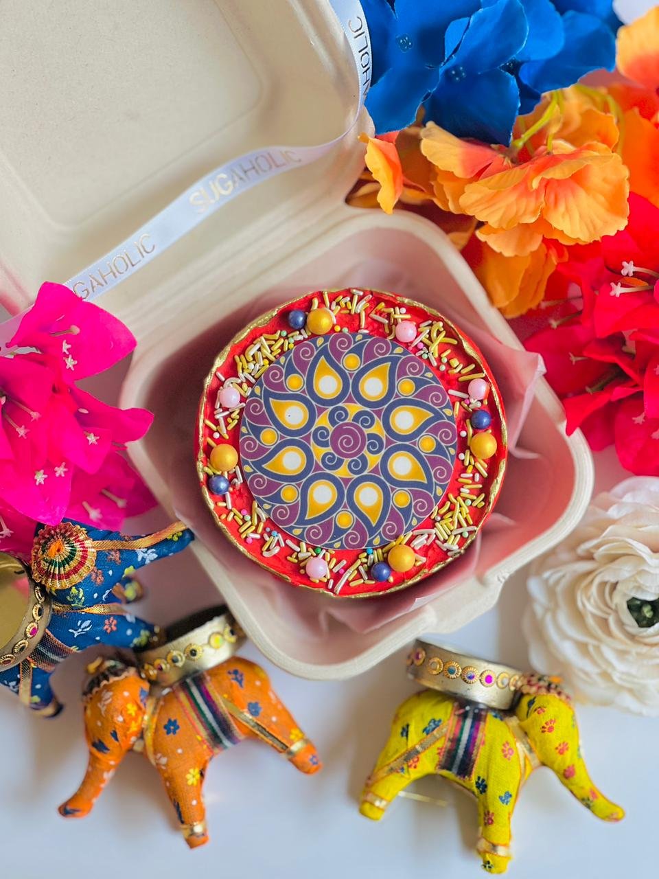 Red Rangoli Bento Cake