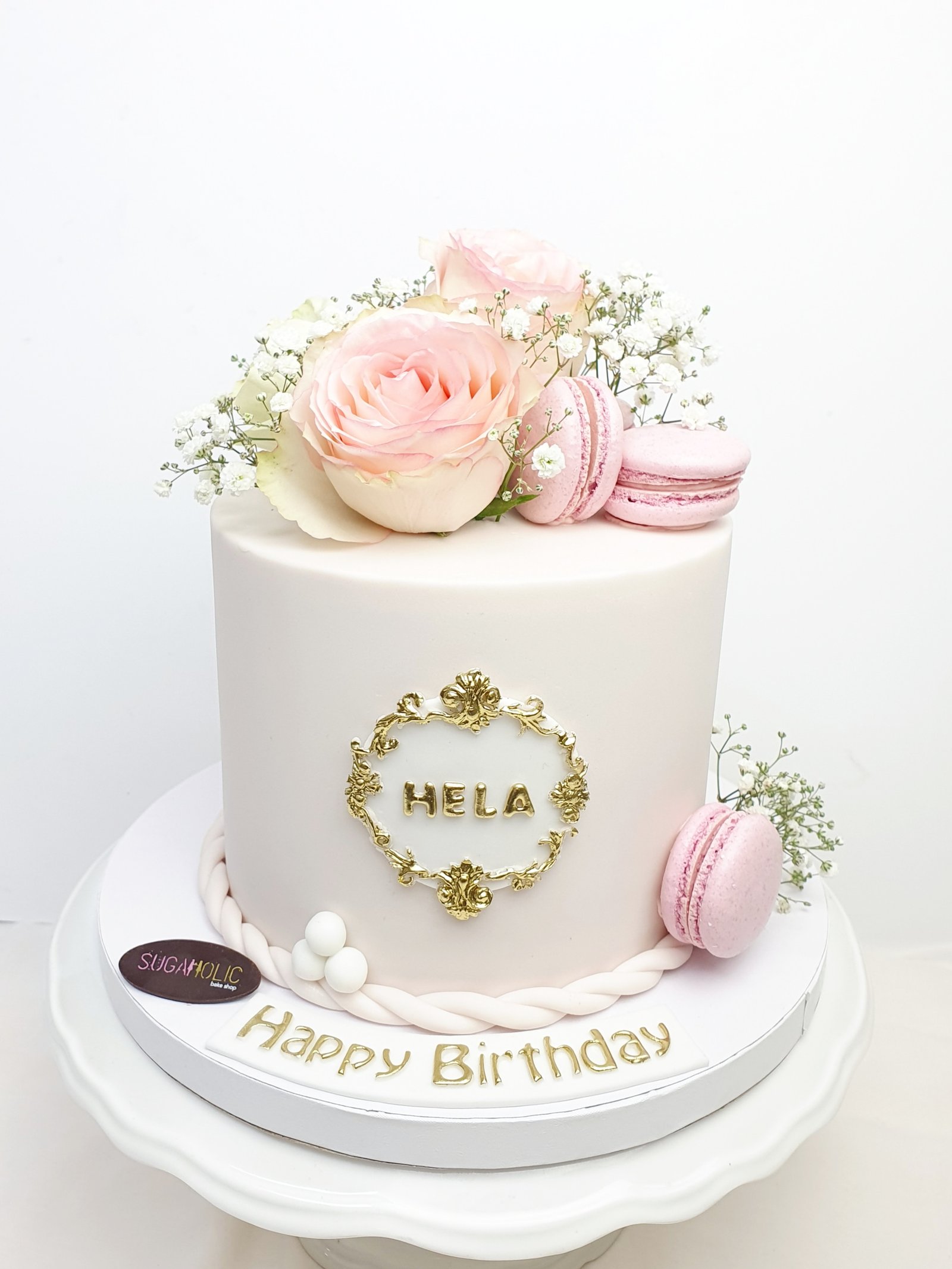 Floral Cake with Macaroons and baby breath