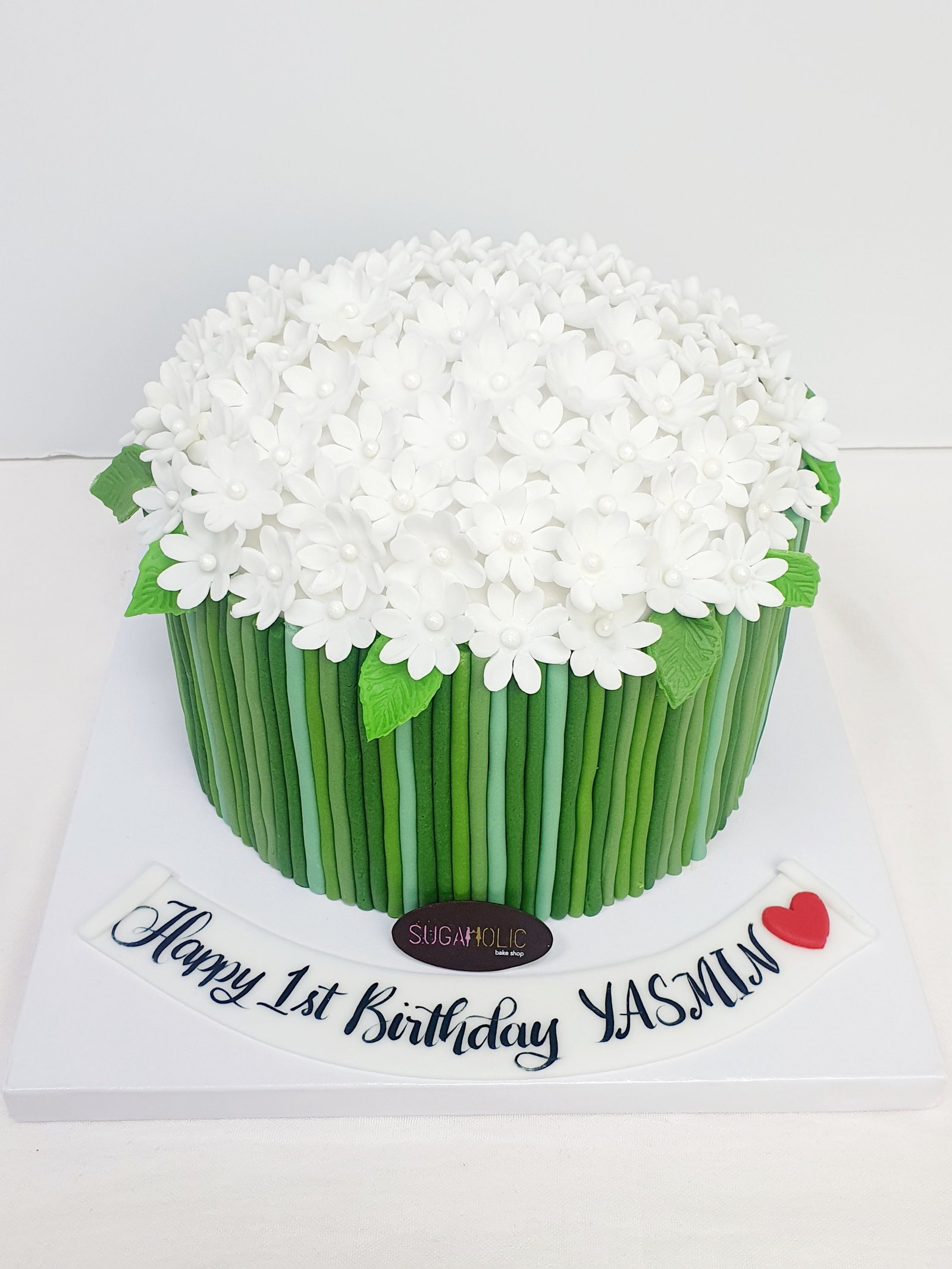 White Flower cake with Green Stems 