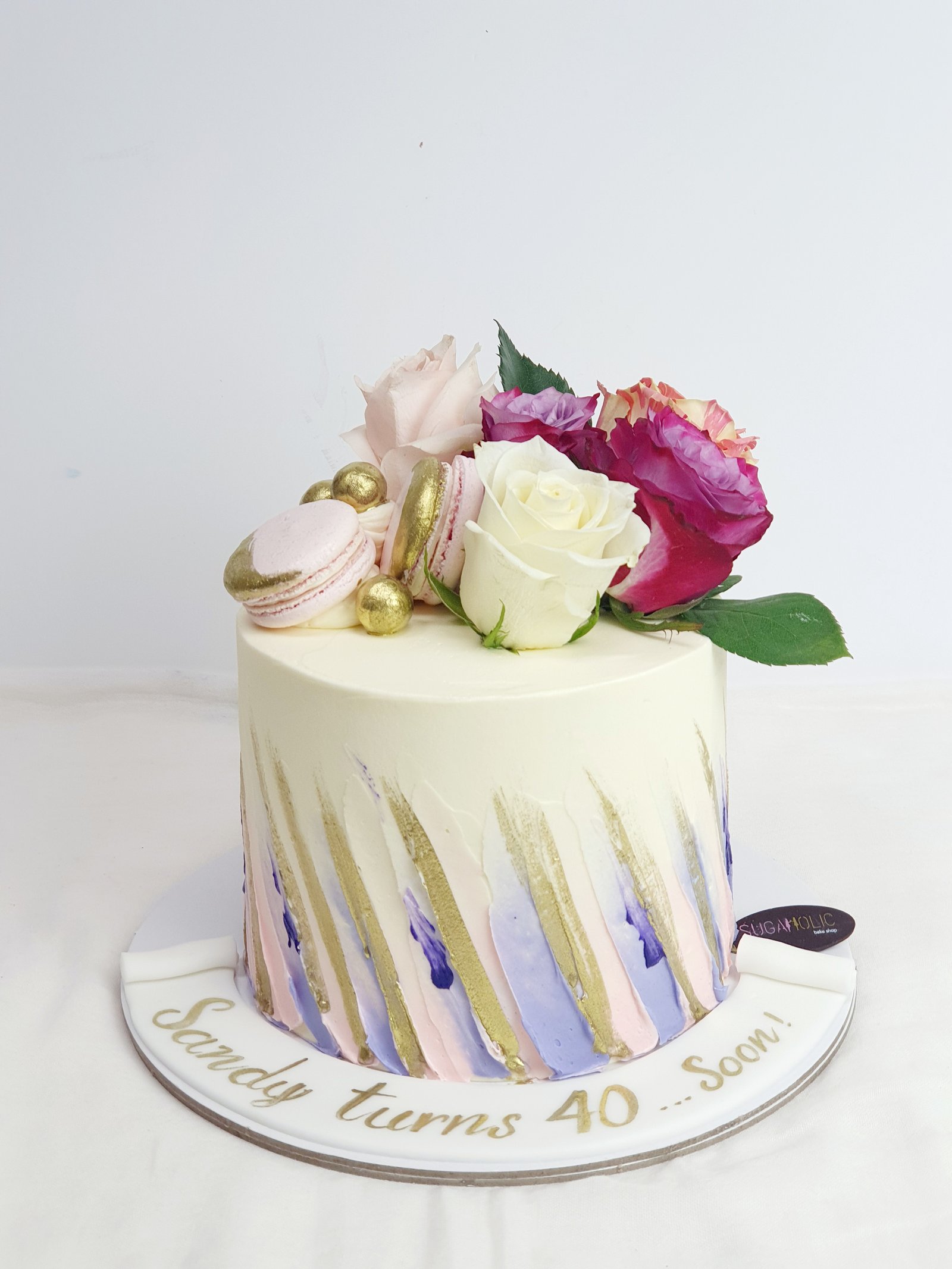 Purple and Gold Strokes Cake with Flowers 