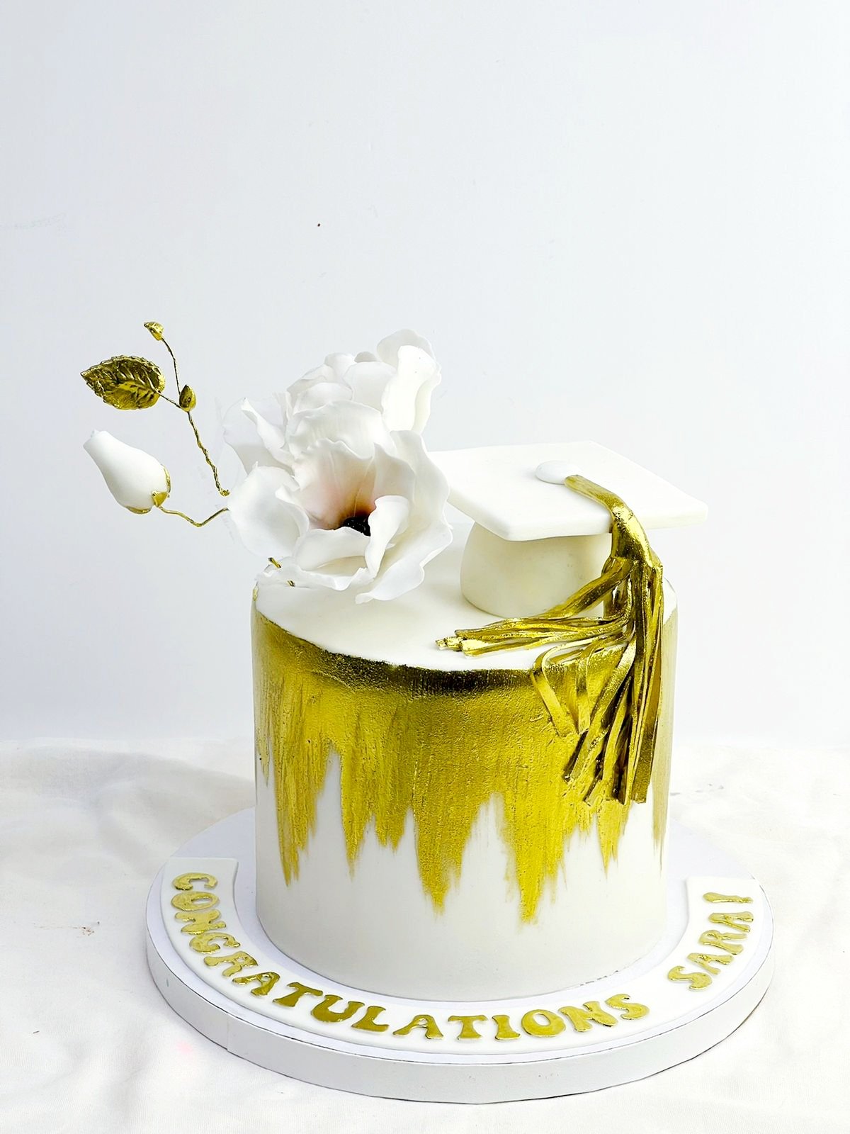 White and Gold Graduation Cake